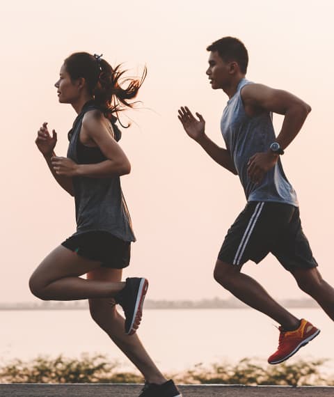 Image of a man and woman jogging together