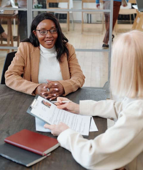 Image of a woman being interviewed by female recruiter