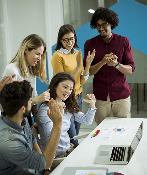 Successful young businesspeople having meeting in modern office