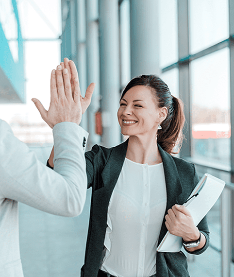 Woman smiling while receiving high five