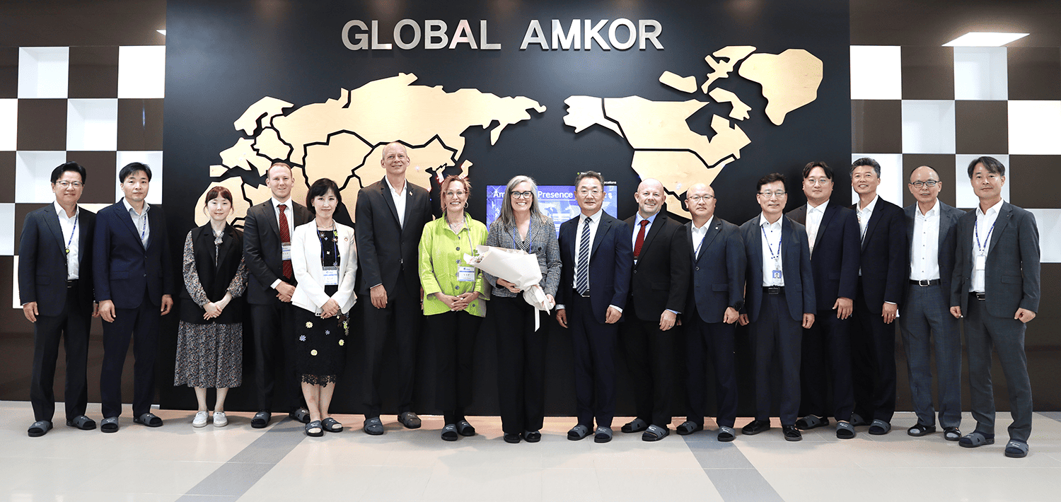 Arizona Governor Katie Hobbs standing with Amkor and Arizona delegation at Amkor Korea
